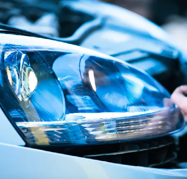 Rénovation phare feux voiture Suisse Romande Réparation impact pare brise Suisse Romande Genève, Lausanne, Fribourg, Neuchâtel, Sion, La Chaux-de-Fonds